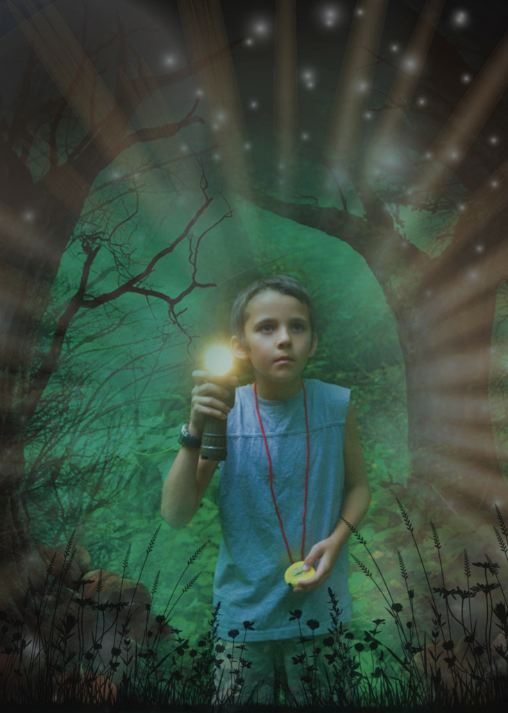 Image of a boy holding a torch